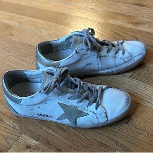 Golden Goose SuperStar with silver star. Size 7